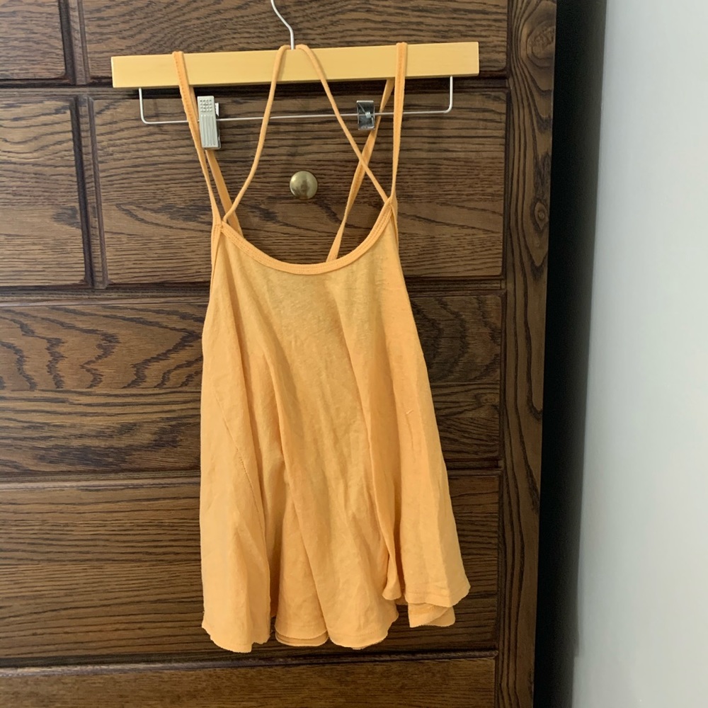 Orange strappy free people tank